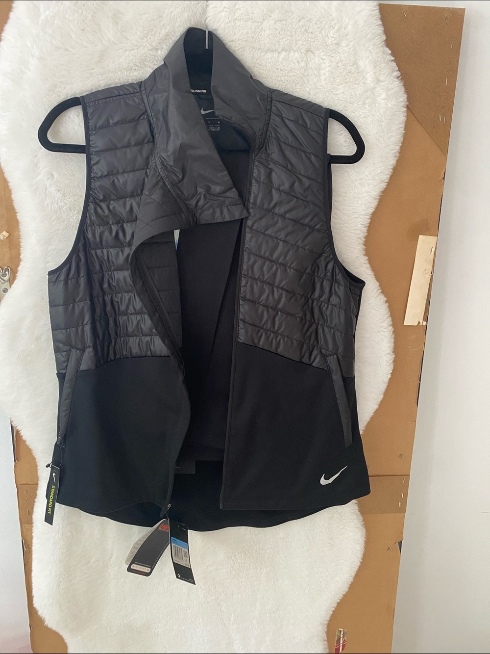 Nike Black Quilted Hybrid Women's Vest with Swoosh Accent